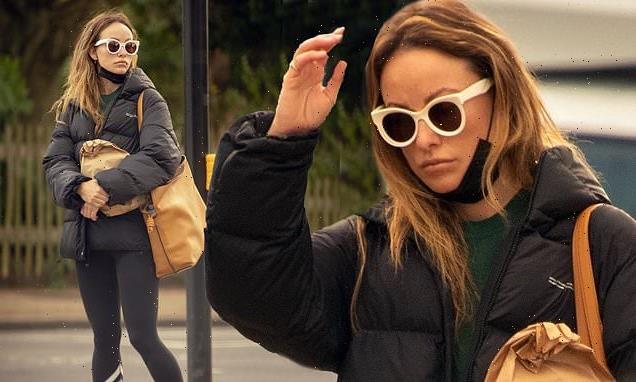 Olivia Wilde goes makeup free in form fitting gym leggings to a salon