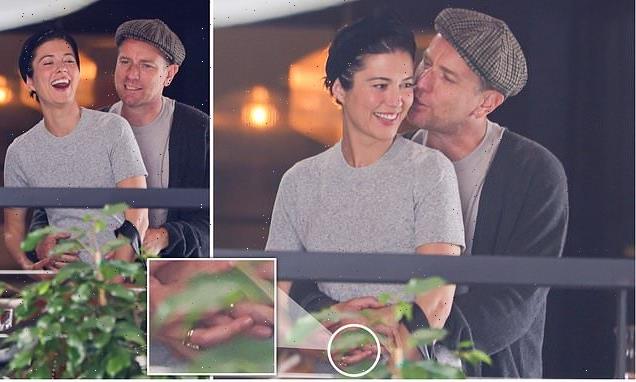 Ewan McGregor and Mary Elizabeth Winstead kiss after tying the knot