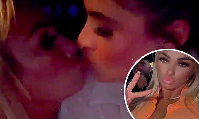 Katie Price kisses her business partner during wild night out