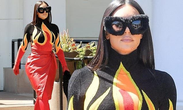 Kim Kardashian dons wacky flame-print catsuit for lunch with sisters