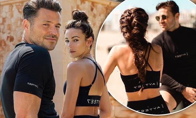 Michelle Keegan shows off her toned figure in a black sports bra