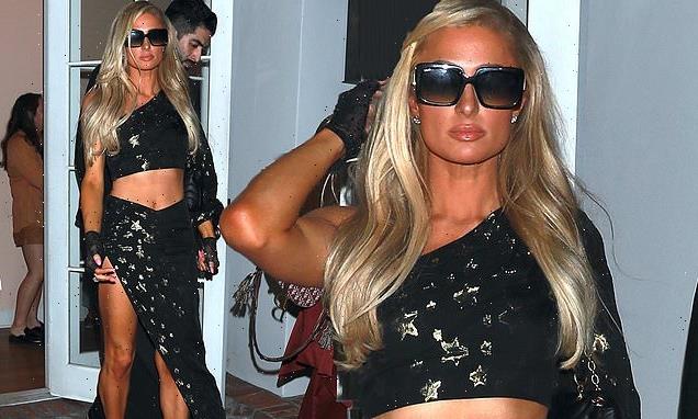Paris Hilton flashes her figure in a co-ord at the Revolve party in LA