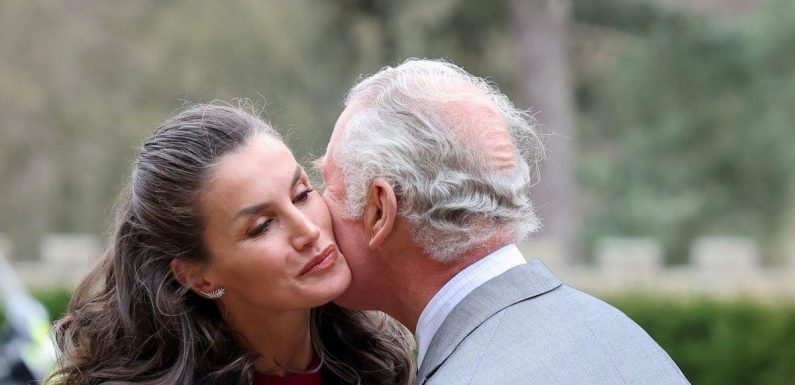 Prince Charles greets Spain’s Queen Letizia with a kiss during rare joint outing