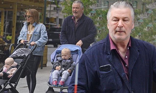 Alec Baldwin and wife Hilaria take their children for a stroll