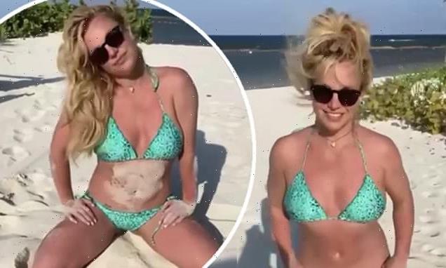 Britney Spears sizzles in a mint two-piece in clip from Mexican trip