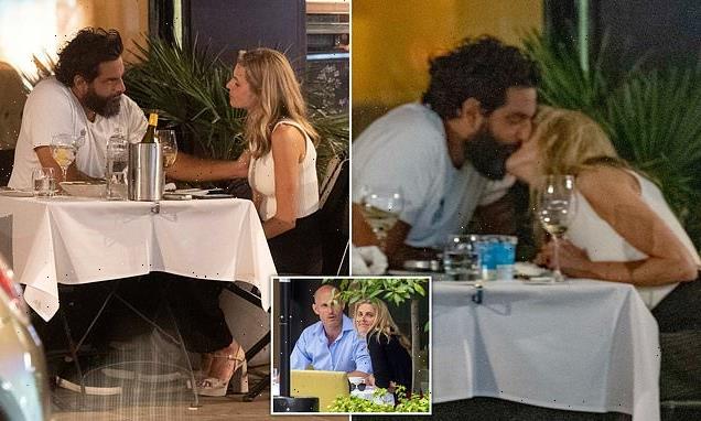 Donna passionately kisses new businessman beau Ashley Smatt