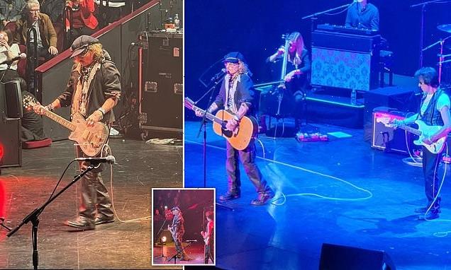 Johnny Depp comes out on stage for performance at Royal Albert Hall