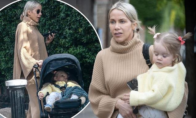 Kate Lawler dons a light brown polo neck sweater on her 42nd birthday