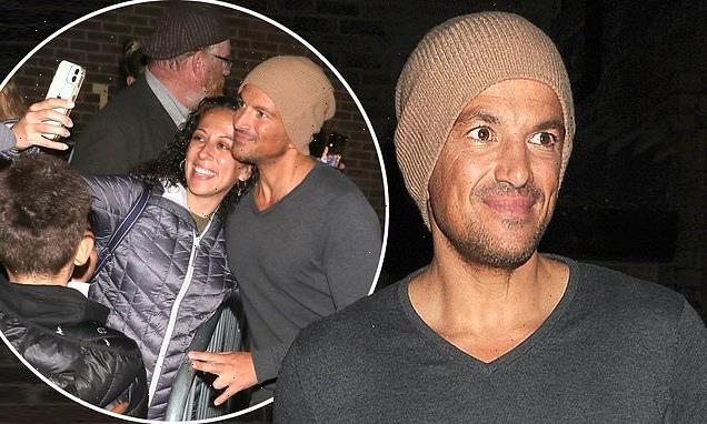 Peter Andre signs autographs at London's Dominion Theatre