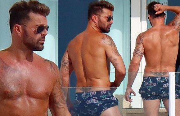 Ricky Martin, 50, puts his chiseled abs front and center
