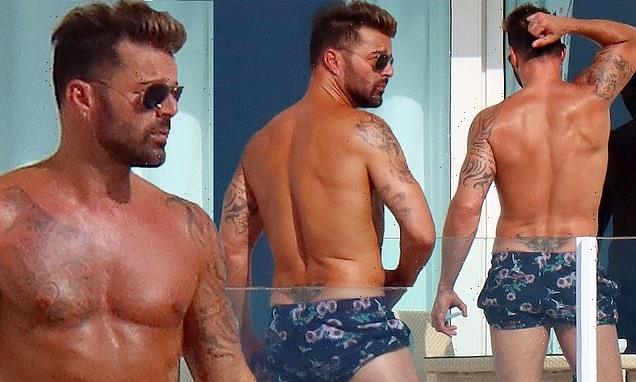 Ricky Martin, 50, puts his chiseled abs front and center