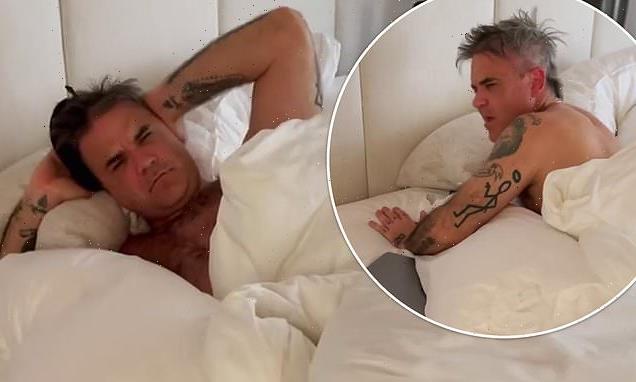 Robbie Williams is fuming after his kids drop water on him to wake up