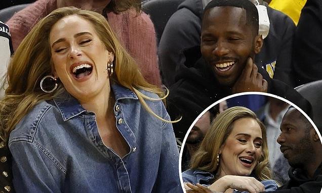 Smitten Adele and Rich Paul can't conceal their smiles at an NBA game