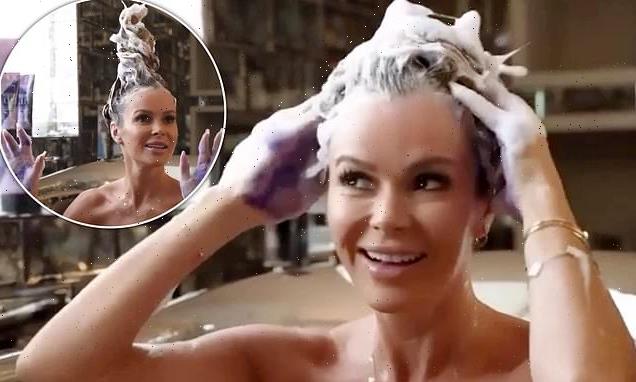 Amanda Holden, 51, strips naked and playfully styles her hair