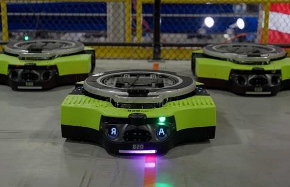Amazon unveils robot designed to move carts around its warehouses