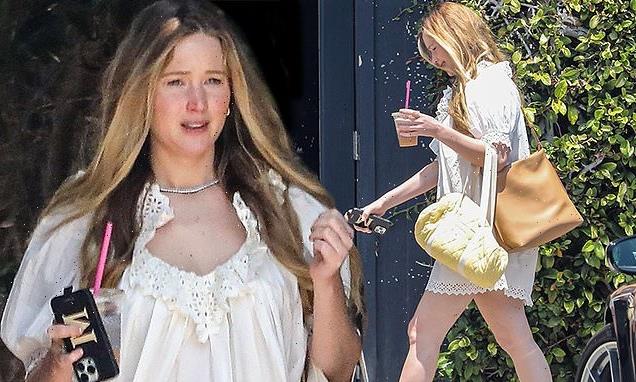Jennifer Lawrence looks angelic in white dress while running errands