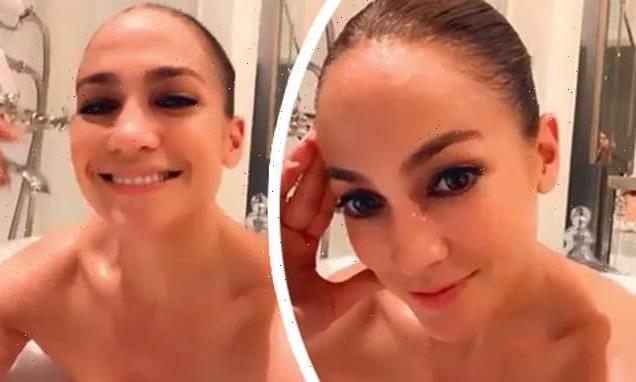 Jennifer Lopez poses in a bathtub with only bubbles