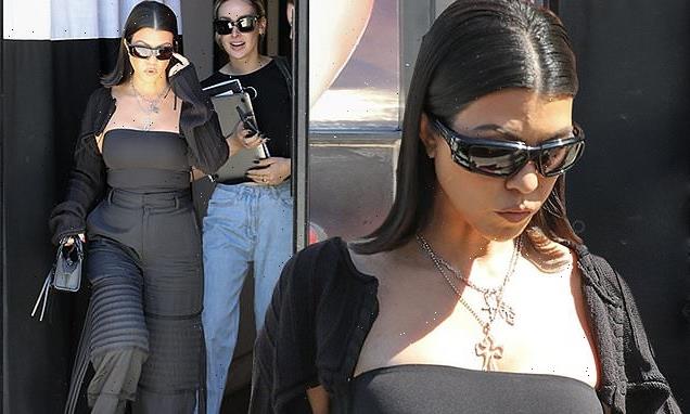 Kourtney Kardashian rocks a busty tube top after a photoshoot in WeHo