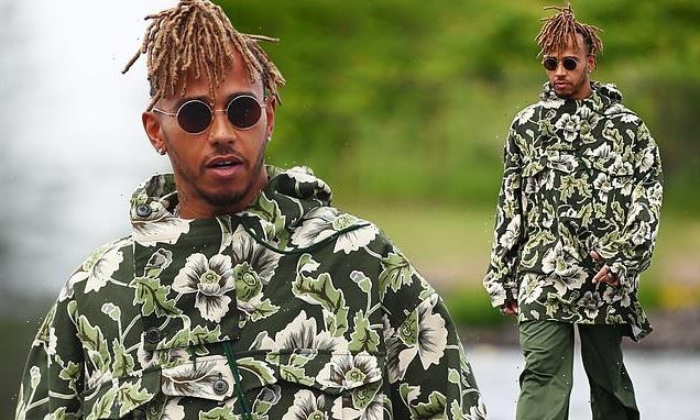 Lewis Hamilton cuts a typically cool figure in a floral Kenzo outfit