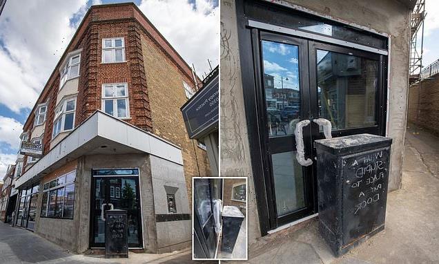 New door installed at old bank put right in front of black metal box