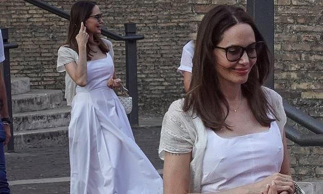 Angelina Jolie looks chic in a white dress as at the Vatican Museum