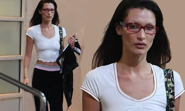 Bella goes BRALESS under thin white crop top during NYC stroll