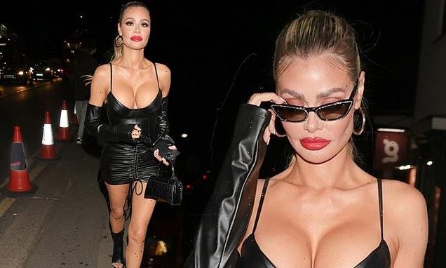 Chloe Sims puts on a VERY busty display in a leather mini dress