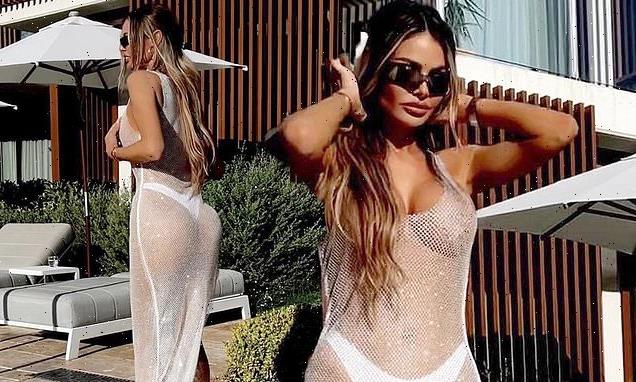 Chloe Sims puts on a VERY busty display in a sheer coverup in Ibiza