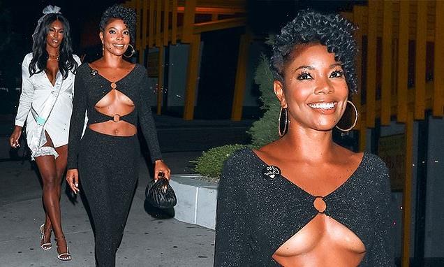 Gabrielle Union flashes underboob in a plunging black jumpsuit in LA