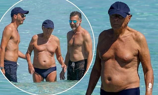 Giorgio Armani, 88, cools off in swimming trunks as he enjoys a dip