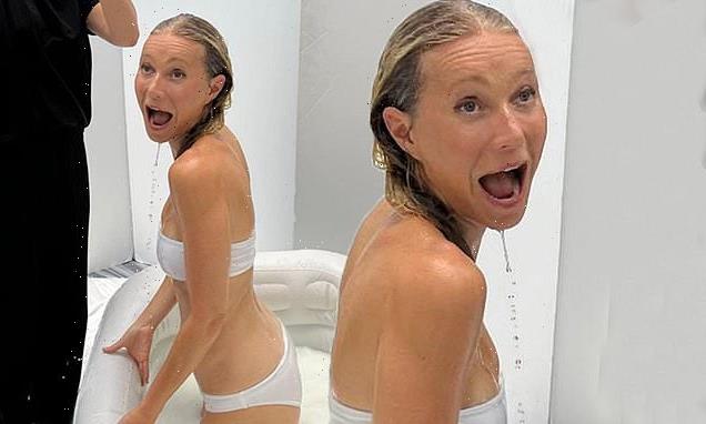 Gwyneth Paltrow shows off her toned figure in a white bikini