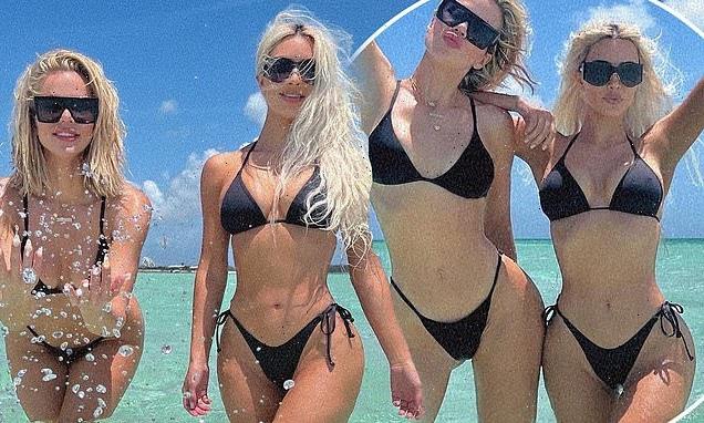 Kim Kardashian and Khloe rock matching bikinis  in Turks and Caicos