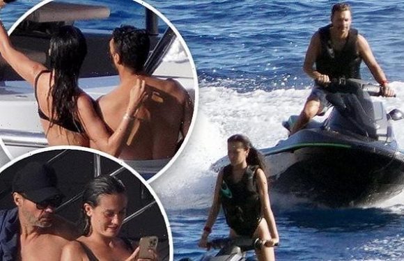 Ryan Seacrest jet skis and takes selfies with Aubrey Paige in Ibiza