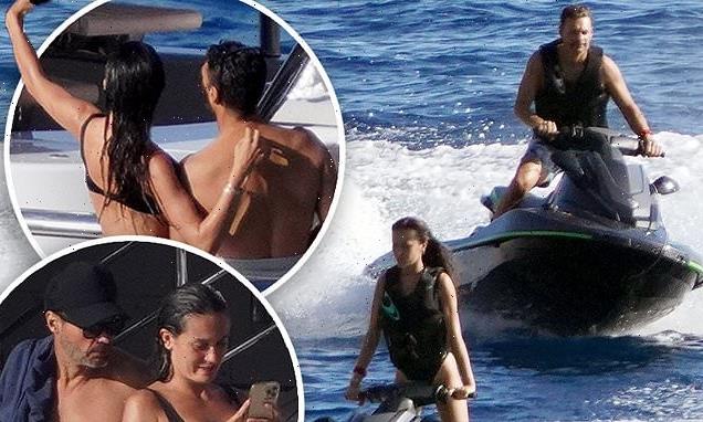 Ryan Seacrest jet skis and takes selfies with Aubrey Paige in Ibiza