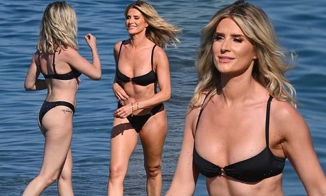 Sarah Jayne Dunn shows off her sizzling physique in a black bikini