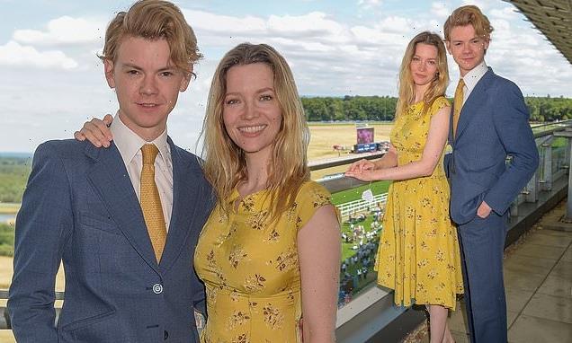 Talulah Riley cosies up to Thomas Brodie-Sangster at Ascot Racecourse
