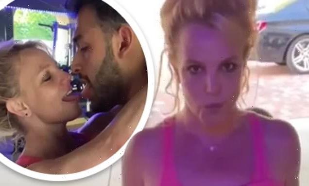 Britney Spears works up a sweat and makes out with Sam Asghari at home