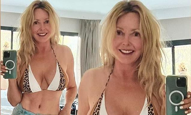 Carol Vorderman, 61, shows off her abs in a bikini at fitness retreat