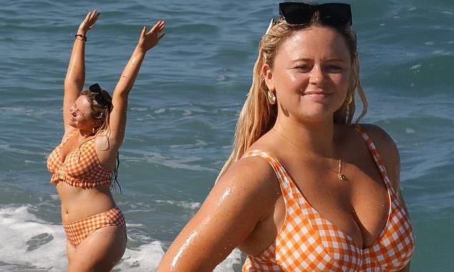 Emily Atack shows off her curves in a plunging gingham bikini in Spain