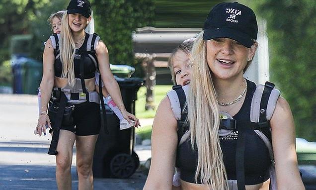 Kate Hudson, 43, straps  daughter, three,  to her BACK for power walk