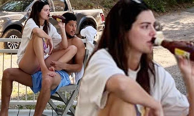 Kendall sits on shirtless Devin's LAP amid claims they are back on