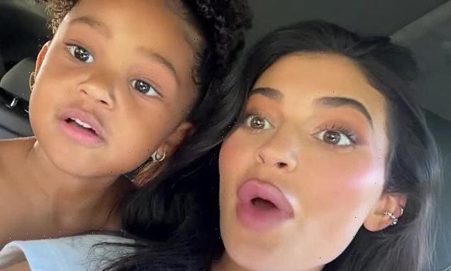Kylie Jenner cuddles up to Stormi, four, as they lip-sync to Mamacita