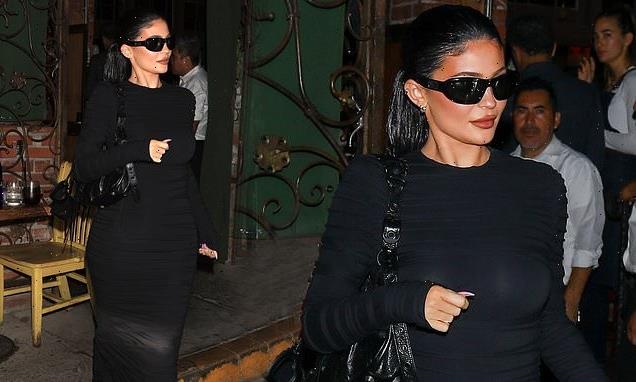 Kylie Jenner dons tight black maxi dress while filming The Kardashians