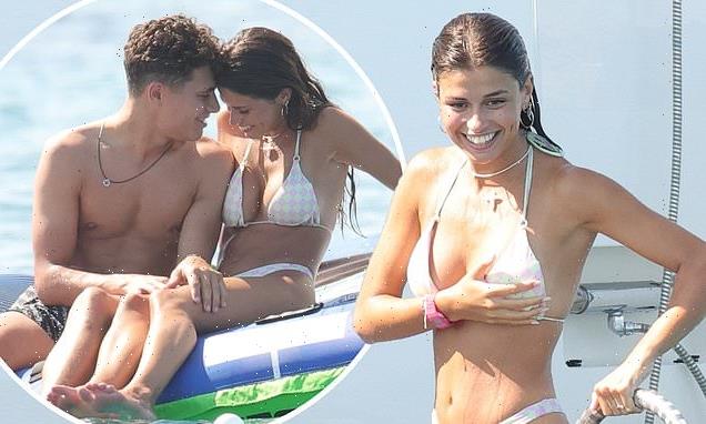 Lando Norris' girlfriend Luisinha Oliveira slips into white bikini