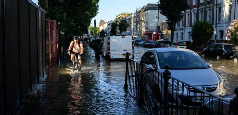 Moment water floods down street causing travel chaos at height of rush hour after main bursts | The Sun