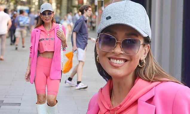 Myleene Klass stands out in an ab-flashing pink crop top