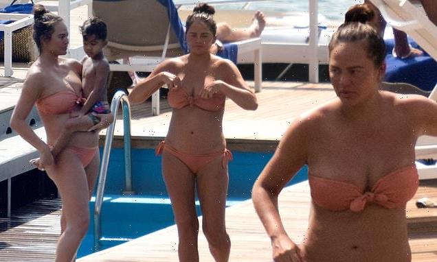 Pregnant Chrissy Teigen shows her growing bump in a bikini in Italy