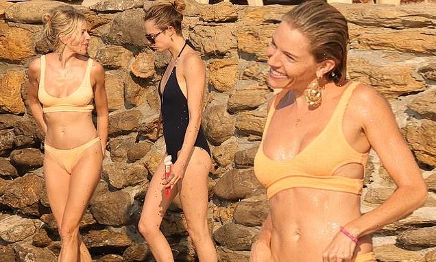 Sienna Miller and Cara Delevingne show off their figures in Ibiza