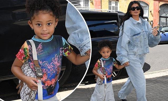 Stormi Webster, four, clutches a £2,600 Dior bag with mum Kylie Jenner