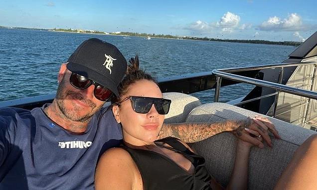 Victoria Beckham puts on a loved-up display with her husband David